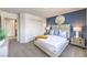Bright bedroom featuring a comfortable bed, and large closet for ample storage at 7915 Pandora Sky St # 402, Las Vegas, NV 89084