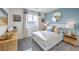 This bedroom features a large window, providing natural light, and stylish decor for a comfortable ambiance at 7915 Pandora Sky St # 402, Las Vegas, NV 89084