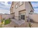 Enclosed backyard with patio, gravel landscaping, and partial turf area, offering a simple outdoor retreat at 7915 Pandora Sky St # 403, North Las Vegas, NV 89084