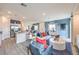 Open-concept living room with direct access to the kitchen and other living areas at 7915 Pandora Sky St # 403, North Las Vegas, NV 89084