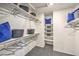 Walk-in closet with ample shelving, hanging space, and plush carpet at 7915 Pandora Sky St # 403, North Las Vegas, NV 89084