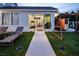 Beautiful backyard with a gym, playground and outdoor seating with nice green grass and concrete pathway at 8000 Clock Tower Ct Ct, Las Vegas, NV 89117