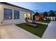 Inviting backyard featuring lounge chairs, playground, and an exercise room visible through sliding glass doors at 8000 Clock Tower Ct Ct, Las Vegas, NV 89117