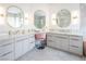 Bathroom featuring dual vanities, modern lighting, and high-end finishes at 8000 Clock Tower Ct Ct, Las Vegas, NV 89117