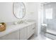 Modern bathroom features marble countertops, vanity, and glass shower with gold trim at 8000 Clock Tower Ct Ct, Las Vegas, NV 89117