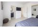 Tastefully decorated bedroom featuring an ensuite bathroom, a comfortable bed, and neutral decor at 8000 Clock Tower Ct Ct, Las Vegas, NV 89117