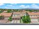 Beautiful two-story home boasting a three-car garage, well-manicured landscaping, and classic design at 8000 Clock Tower Ct Ct, Las Vegas, NV 89117