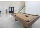 Game room with a stylish pool table, staircase, and grand entry to the home at 8000 Clock Tower Ct Ct, Las Vegas, NV 89117