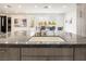 Spacious kitchen island with a sink and ample counter space, perfect for food preparation and entertaining at 8000 Clock Tower Ct Ct, Las Vegas, NV 89117