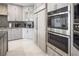 Modern kitchen featuring stainless steel appliances, custom cabinetry, and stylish backsplash at 8000 Clock Tower Ct Ct, Las Vegas, NV 89117