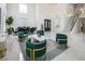 Open living area with a staircase, stylish furniture, and an elegant dining set at 8000 Clock Tower Ct Ct, Las Vegas, NV 89117