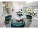 Bright living room with high ceilings, modern decor, and access to the outdoor patio and pool at 8000 Clock Tower Ct Ct, Las Vegas, NV 89117