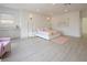 Bright main bedroom suite with a large bed, modern lighting, and a convenient wet bar area at 8000 Clock Tower Ct Ct, Las Vegas, NV 89117