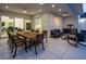 Relaxing outdoor patio with dining area, lounge seating, and a built-in BBQ grill at 8000 Clock Tower Ct Ct, Las Vegas, NV 89117