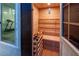 Interior of a private sauna, complete with wooden benches and a heater, perfect for relaxation and wellness at 8000 Clock Tower Ct Ct, Las Vegas, NV 89117