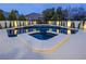 Custom pool design with a built-in spa, surrounded by tasteful landscaping and ambient lighting for evening enjoyment at 8000 Clock Tower Ct Ct, Las Vegas, NV 89117