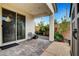 This patio features an outdoor storage shed and lush, mature landscaping at 8811 Pauley Hills St, Las Vegas, NV 89131