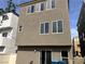 Exterior back view of the home highlighting the stucco and windows at 9535 Leaping Lizard St, Las Vegas, NV 89178