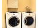 Laundry room with matching front load washer and dryer at 9535 Leaping Lizard St, Las Vegas, NV 89178