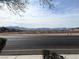 View of the surrounding neighborhood and distant mountains at 9535 Leaping Lizard St, Las Vegas, NV 89178