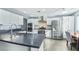 Bright kitchen with modern stainless steel appliances and a breakfast bar at 9709 Terrace Green Ave, Las Vegas, NV 89117