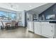 Kitchen with stainless steel appliances and adjacent to dining area at 9709 Terrace Green Ave, Las Vegas, NV 89117