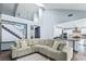 Spacious living area with a staircase and kitchen view at 9709 Terrace Green Ave, Las Vegas, NV 89117