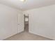 Bedroom featuring neutral walls and carpet, with open doorway at 10103 Flagstaff Butte Ave, Las Vegas, NV 89148