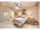 Well-lit bedroom features a comfortable bed, and classic furnishings at 10290 Profeta Ct, Las Vegas, NV 89135
