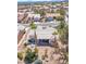 Aerial view of home featuring landscaping, stone table with seating, and palm trees at 10920 Black Ledge Ave, Las Vegas, NV 89134