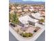 Aerial view of home and neighborhood featuring desert landscaping, and tile roofs at 10920 Black Ledge Ave, Las Vegas, NV 89134