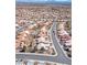 Wide aerial view of neighborhood showcasing the many homes with desert landscaping at 10920 Black Ledge Ave, Las Vegas, NV 89134