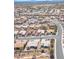Aerial view showing desert community layout with winding streets and numerous homes at 10920 Black Ledge Ave, Las Vegas, NV 89134
