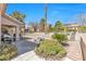 Well-maintained backyard with desert landscaping and an outdoor seating area at 10920 Black Ledge Ave, Las Vegas, NV 89134