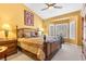 Comfortable bedroom with vaulted ceilings, a shuttered bay window, and carpeted floors at 10920 Black Ledge Ave, Las Vegas, NV 89134
