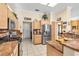 Kitchen featuring stainless steel appliances, tile flooring, and granite counters at 10920 Black Ledge Ave, Las Vegas, NV 89134