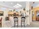 Kitchen with bar seating and stainless steel appliances at 10920 Black Ledge Ave, Las Vegas, NV 89134
