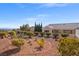 Well-maintained desert landscaping, offering a low-maintenance and visually appealing outdoor space with neighborhood views at 10921 Grand Haven Ave, Las Vegas, NV 89134