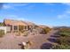 Desert landscaped backyard providing a private oasis, complemented by low maintenance ground cover at 10921 Grand Haven Ave, Las Vegas, NV 89134