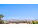 Elevated view showcases the city skyline against a backdrop of distant mountains at 10921 Grand Haven Ave, Las Vegas, NV 89134