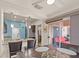 Inviting dining area with access to the backyard and a view of the well-equipped kitchen at 10921 Grand Haven Ave, Las Vegas, NV 89134