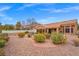 Charming home featuring low-maintenance desert landscaping and a private backyard at 10921 Grand Haven Ave, Las Vegas, NV 89134