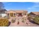 Backyard featuring low-maintenance desert landscaping, creating a tranquil and inviting outdoor space at 10921 Grand Haven Ave, Las Vegas, NV 89134