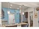 Stylish kitchen featuring a breakfast bar, stainless steel appliances, and granite countertops at 10921 Grand Haven Ave, Las Vegas, NV 89134
