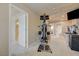Bright bonus room featuring a Bowflex home gym and neutral color palette at 1131 Sax Fifth Ave, Henderson, NV 89052