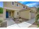 Well-maintained home featuring desert landscaping, a welcoming entrance, and an attached two-car garage at 1131 Sax Fifth Ave, Henderson, NV 89052
