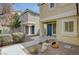 Charming home exterior showcasing desert landscaping, a welcoming entrance, and well-manicured surroundings at 1131 Sax Fifth Ave, Henderson, NV 89052