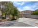 Charming two-story home featuring a well-maintained lawn and desert landscaping, with an attached two-car garage at 1131 Sax Fifth Ave, Henderson, NV 89052