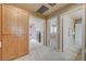 Hallway showing bedroom and bathroom access, with ample storage and an open, airy feel at 1131 Sax Fifth Ave, Henderson, NV 89052
