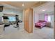 Loft space featuring a home gym and adjacent bedroom, offering versatile living options at 1131 Sax Fifth Ave, Henderson, NV 89052